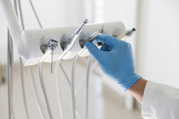 Professional Tooth Extraction technician working in Pingree Grove, IL